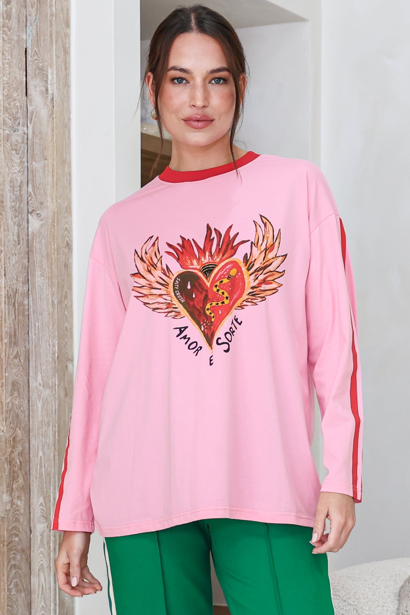 Amor E Sorte Long Sleeve Tee - Crew Neck Contrast Sport Stripe Graphic T-Shirt in Pink